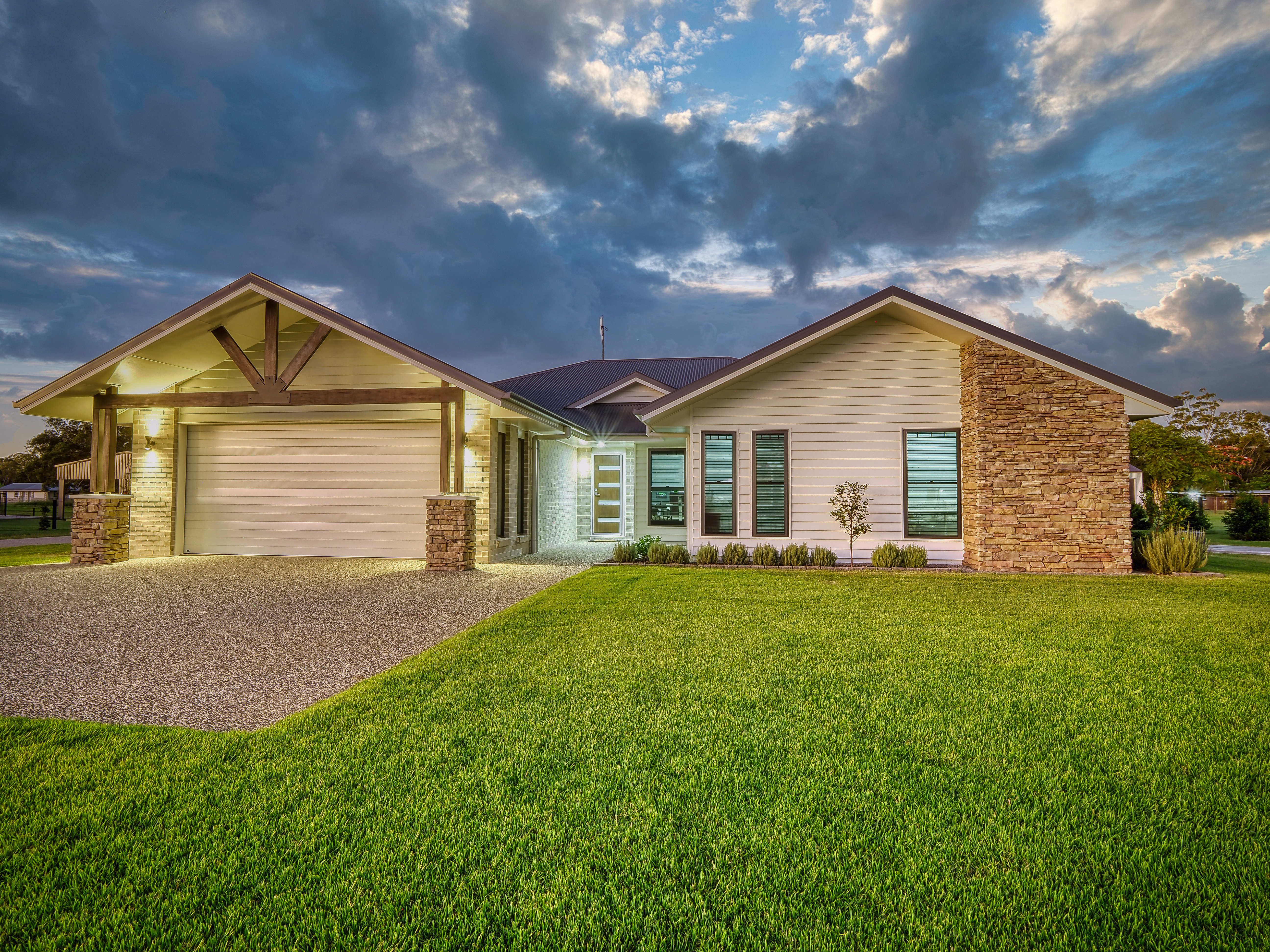 Twilight shots of a home add warmth and appeal to a home